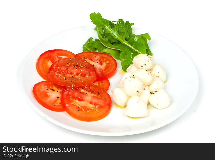 Starter of mozzarella and tomato salad