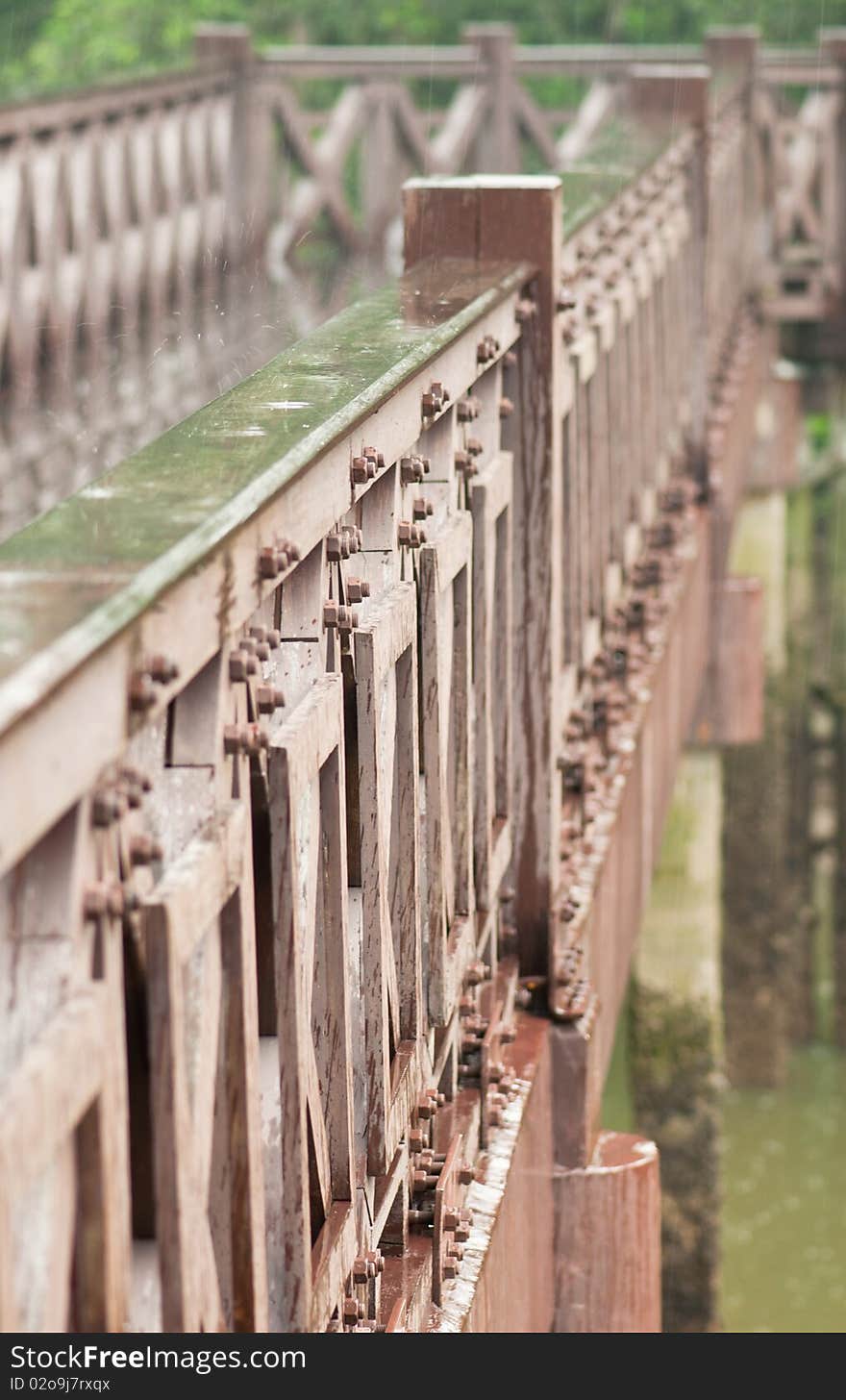 A Portrait of Wooden Bridge During Rain. A Portrait of Wooden Bridge During Rain