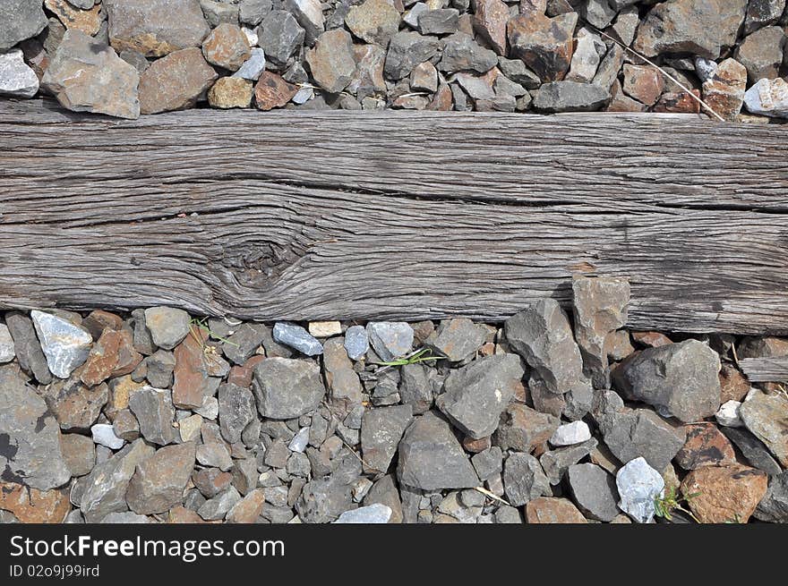 Old wooden support railway and stone. Old wooden support railway and stone