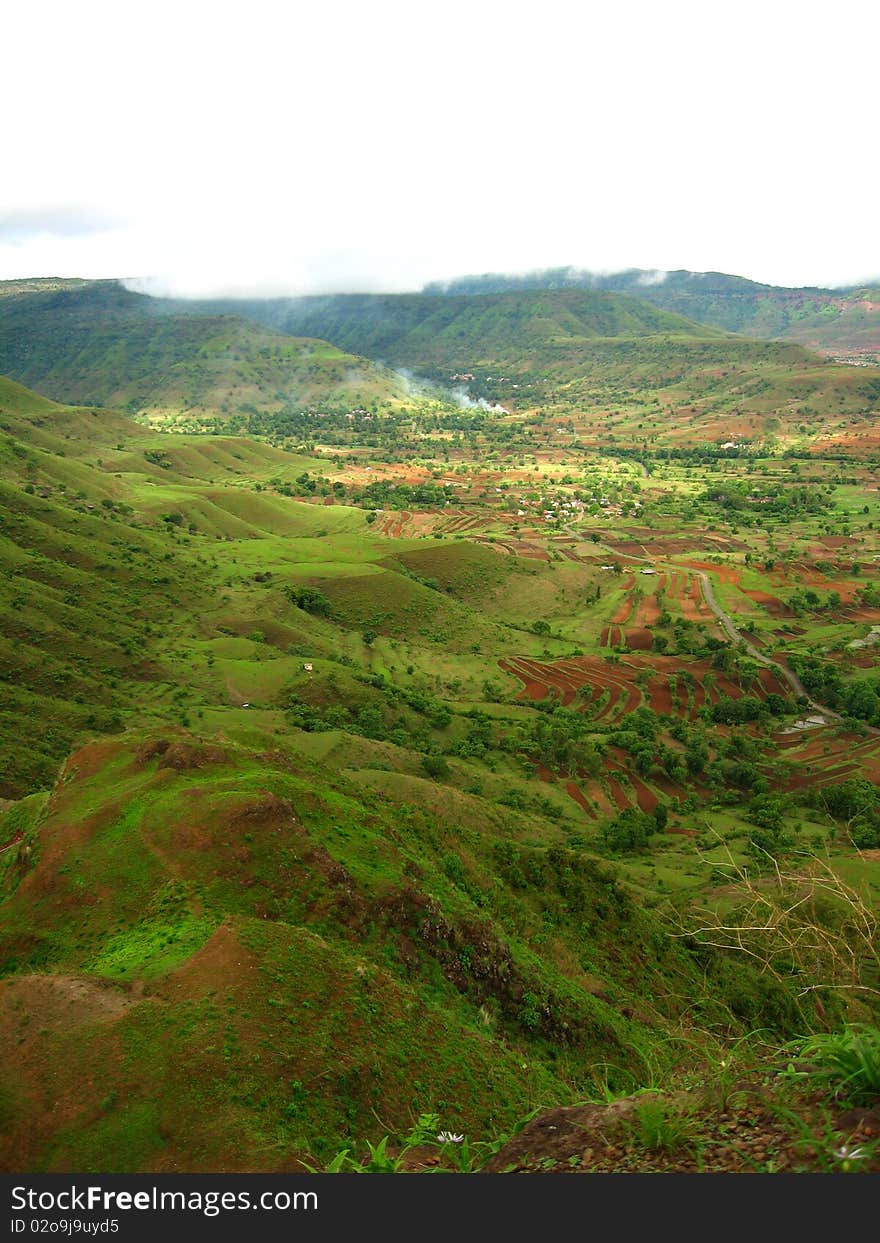 A beautiful and vibrant landscape with green mountain ranges.