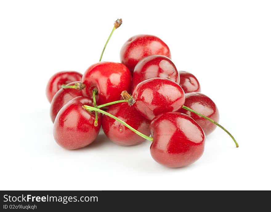 Heap of sweet cherries isolated on white