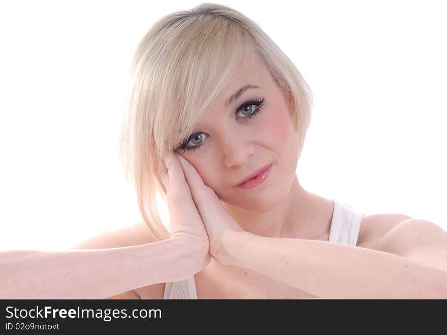 Photograph showing beautiful young blond woman in high key portrait isolated against white. Photograph showing beautiful young blond woman in high key portrait isolated against white