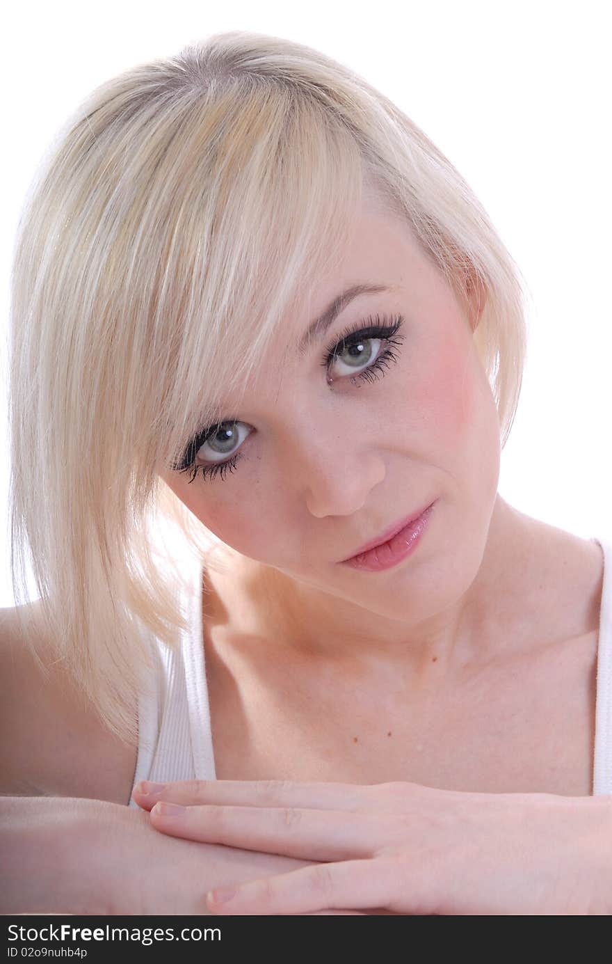 Photograph showing beautiful young blond woman in high key portrait isolated against white. Photograph showing beautiful young blond woman in high key portrait isolated against white