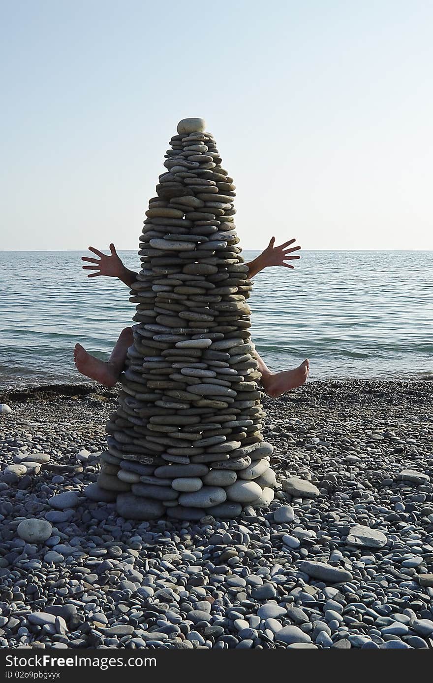 Curious structure of the stones and fun lesson on the beach. Curious structure of the stones and fun lesson on the beach