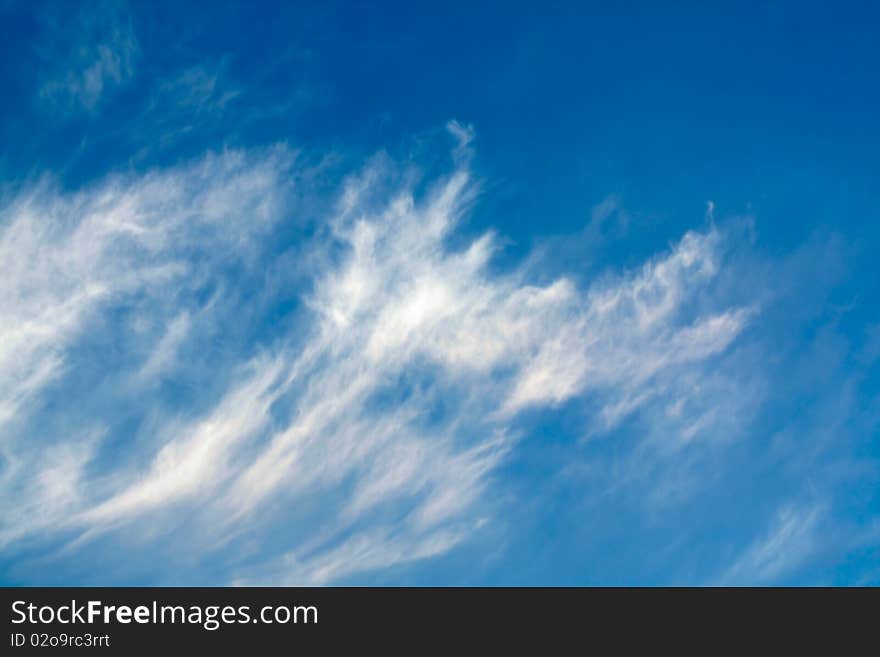 Clouds on the blue sky.