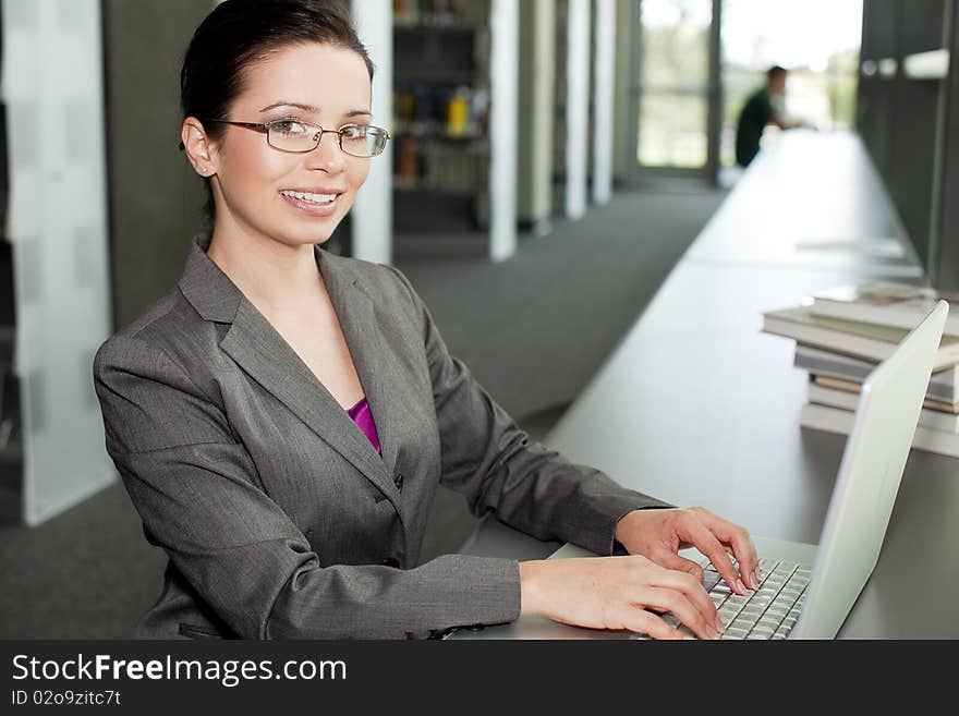 Business woman working at a desk