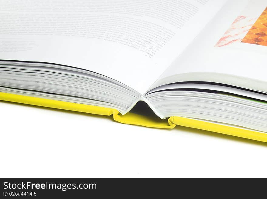 Close up of open text book isolated. Close up of open text book isolated