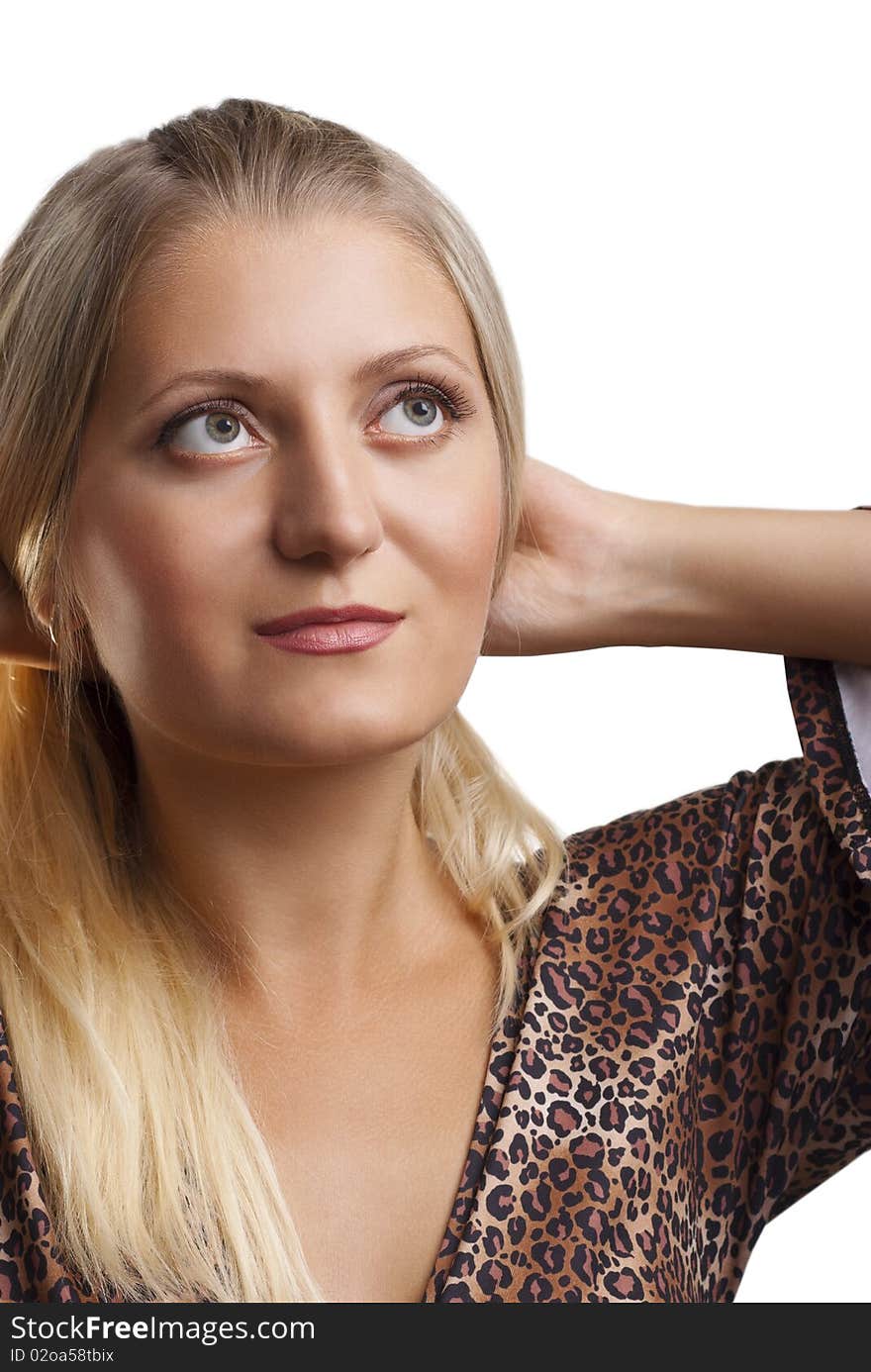 Young blonde woman with big gray green eyes on a white background