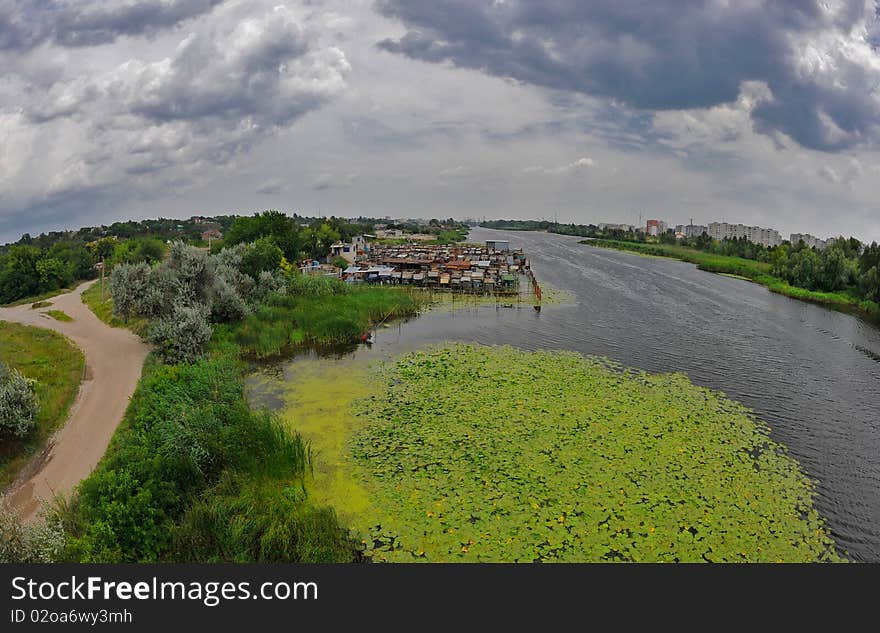 Beautiful panorama of Dnieper River, Koshevaya, Kherson in July 2010 with fishermen