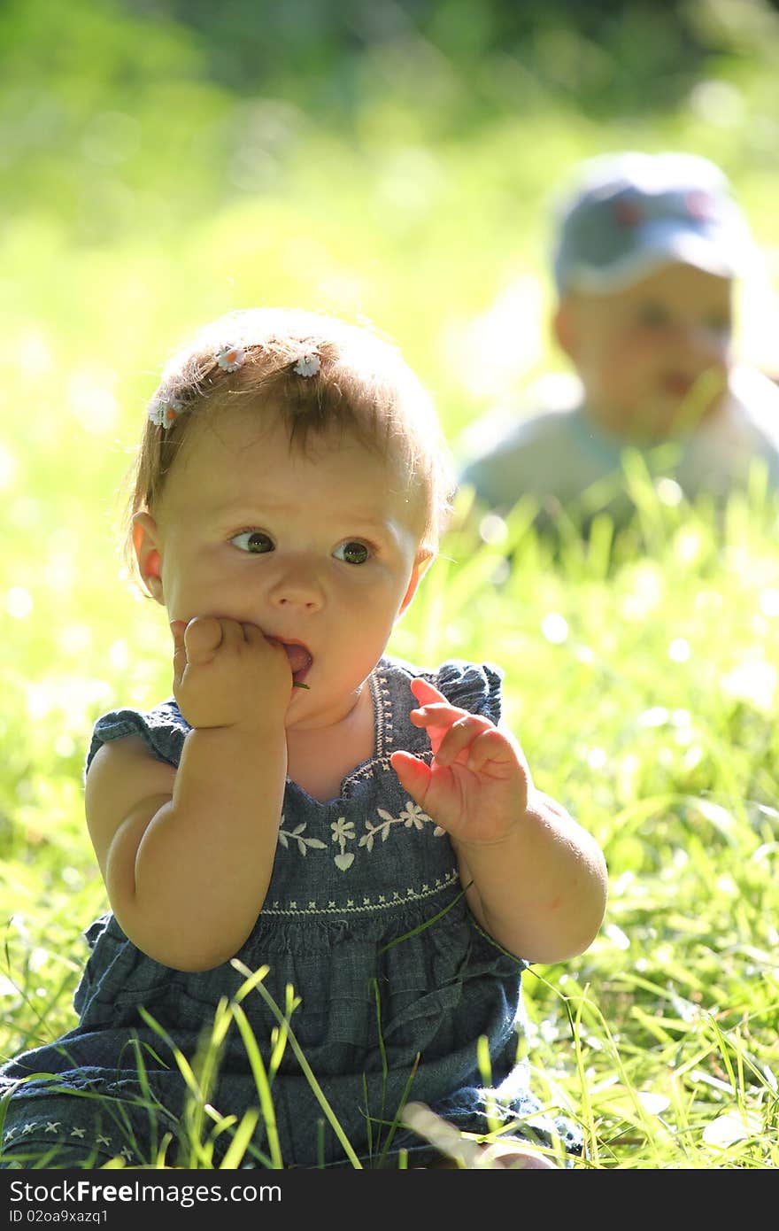 The girl on a green grass. The girl on a green grass