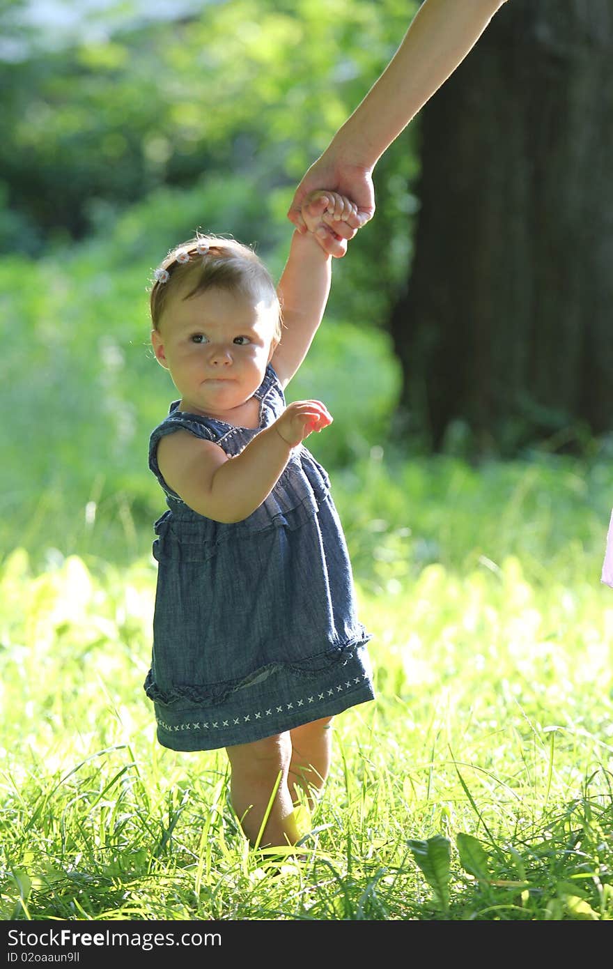 The girl on a green grass. The girl on a green grass