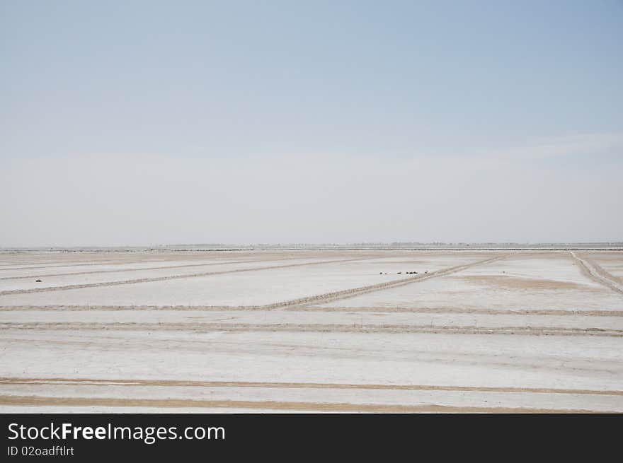 Alkaline land under the blue sky.