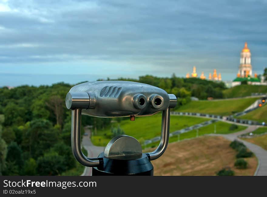 Pay Binoculars And Kyiv Cityscape