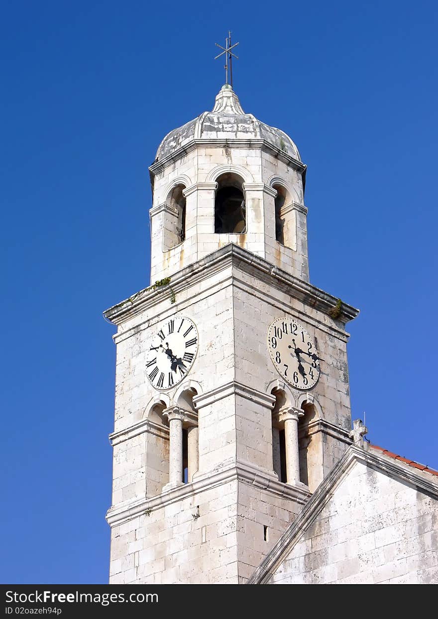 Shot of the bell tower of the catholic church. Shot of the bell tower of the catholic church.