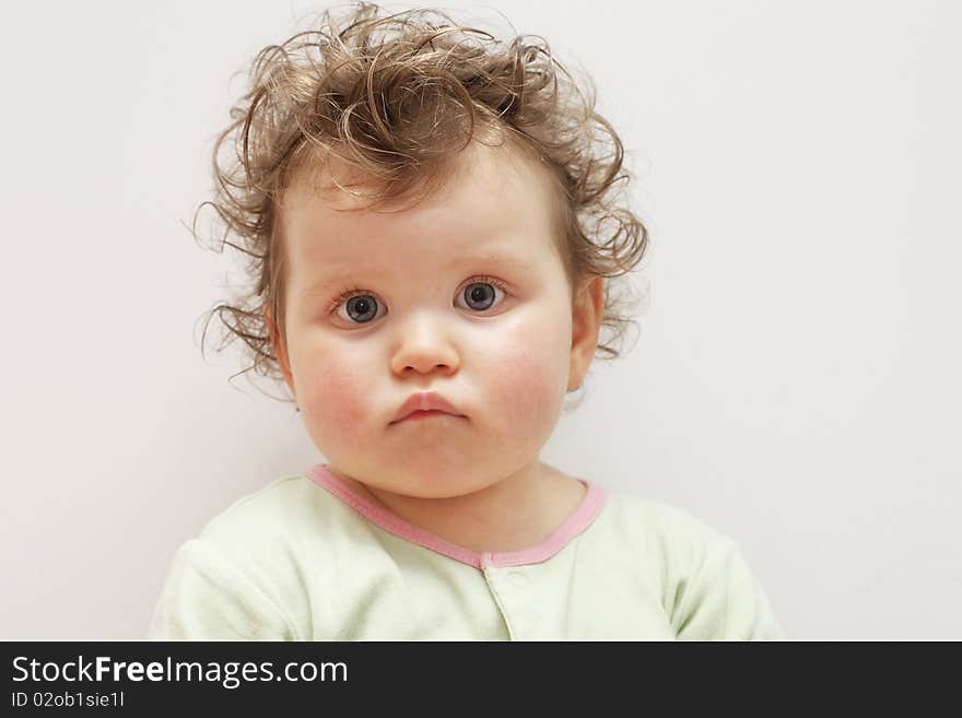 Portrait of young girl on white background