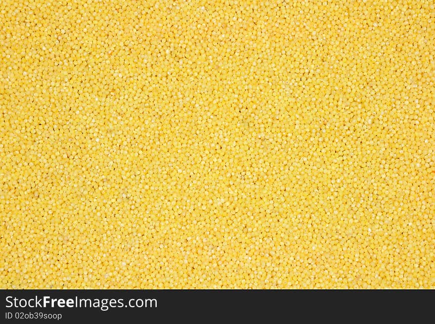 Background of natural fresh yellow millet groats. Background of natural fresh yellow millet groats