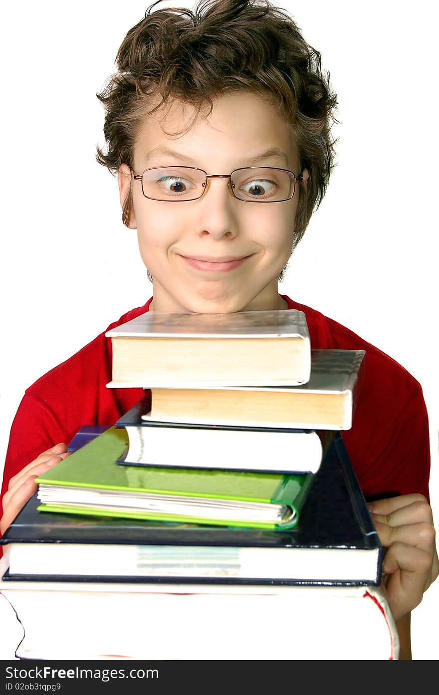 Funny boy wearing glasses with set of books isolated. Funny boy wearing glasses with set of books isolated