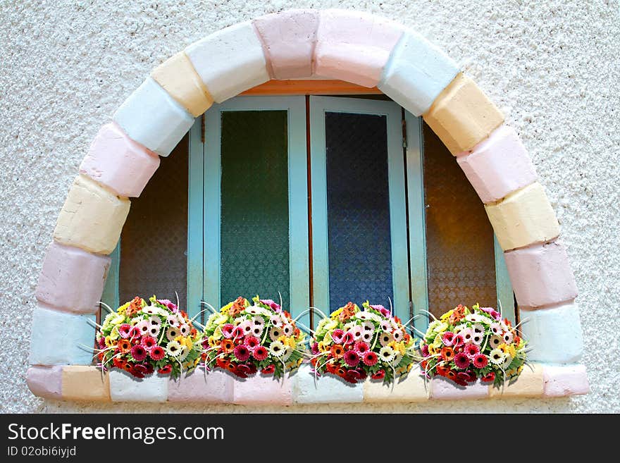 Brickbat window with beautiful flowers