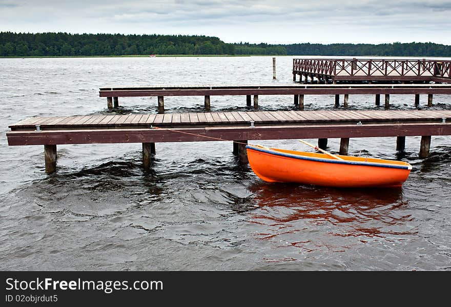 Lifeguard boat moored to the pier. Lifeguard boat moored to the pier