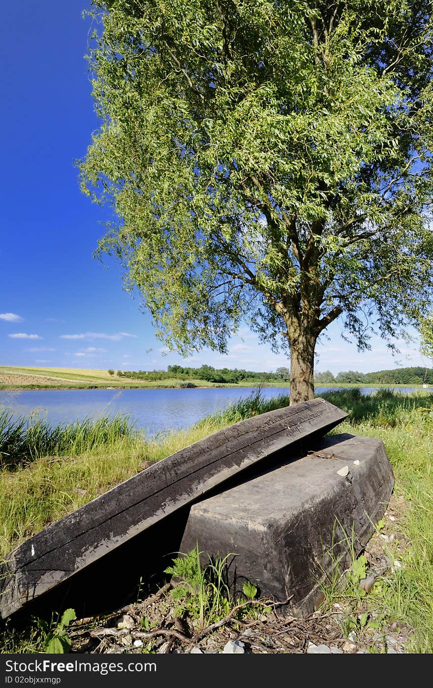 Old wooden boats beside the lake