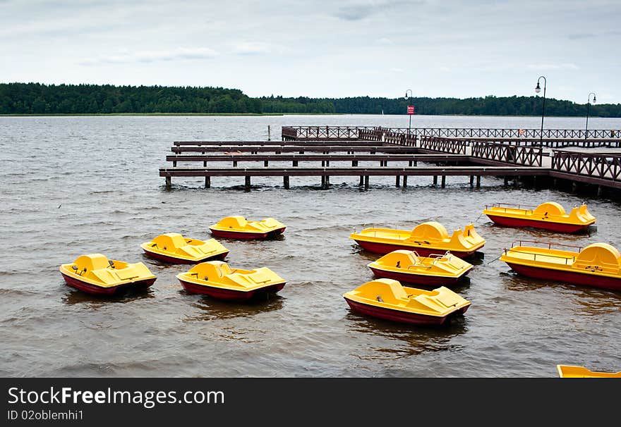 Yellow Pedal Boats for rent at lake. Yellow Pedal Boats for rent at lake