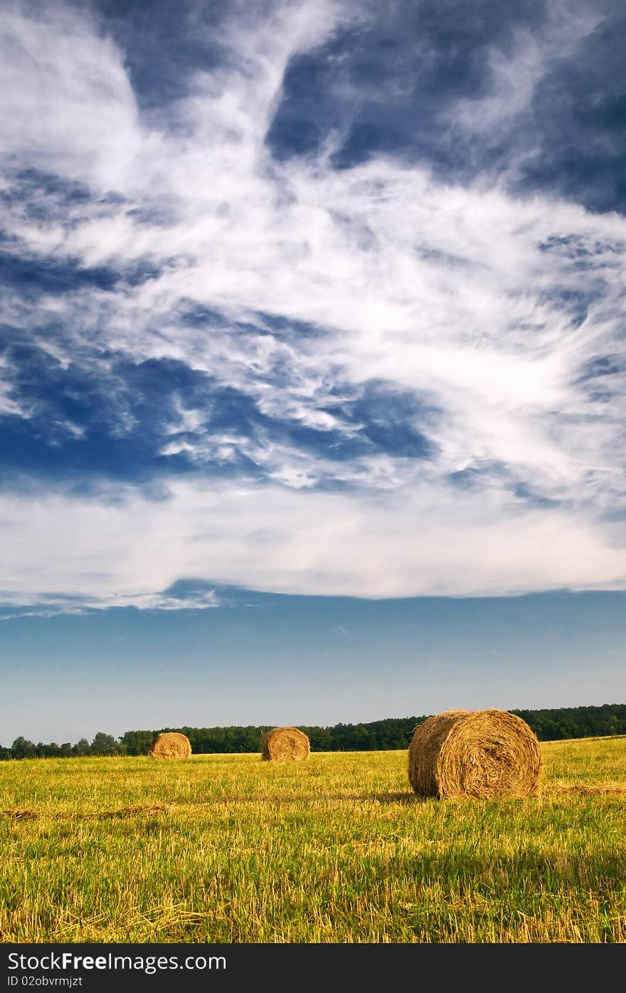 Haystack and stubble by summertime.