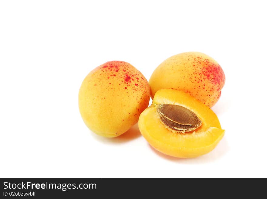 Ripe apricots are isolated on a white background. Ripe apricots are isolated on a white background