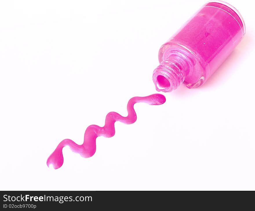 Spilled pink,glossy nail polish isolated on white background. Spilled pink,glossy nail polish isolated on white background