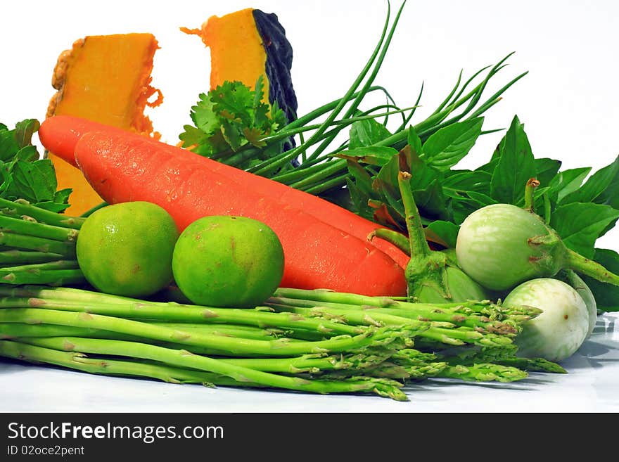 Many fresh vegetables on white background.