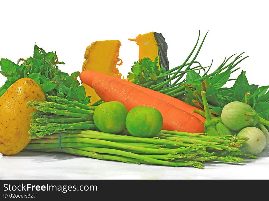 Many fresh vegetables on white background.