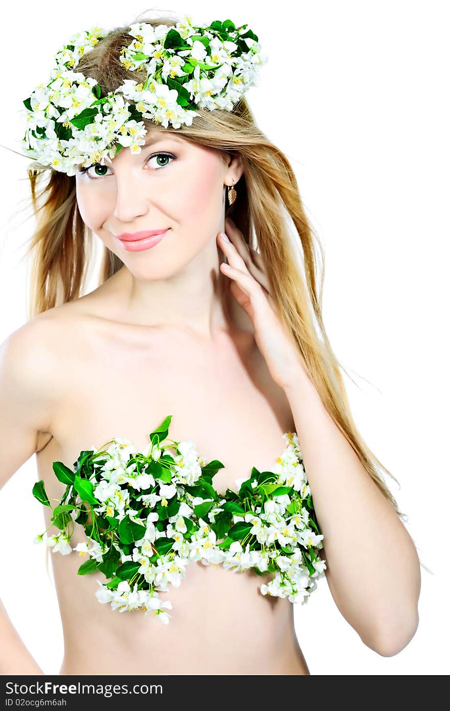 Portrait of a beautiful spring girl in apple tree flowers. Portrait of a beautiful spring girl in apple tree flowers.