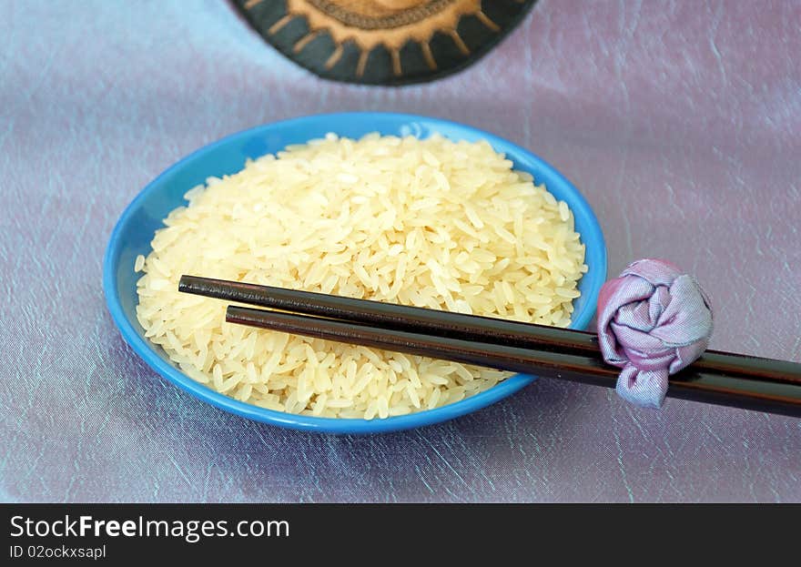 Blue Plate With Rice And Chopsticks