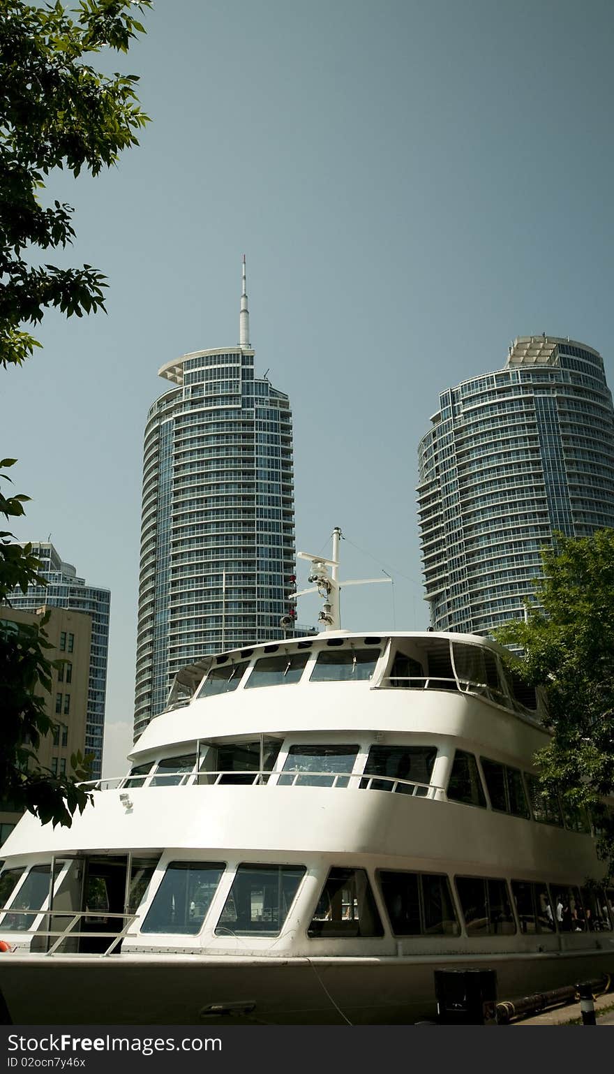 Passenger ship with condos in background. Passenger ship with condos in background