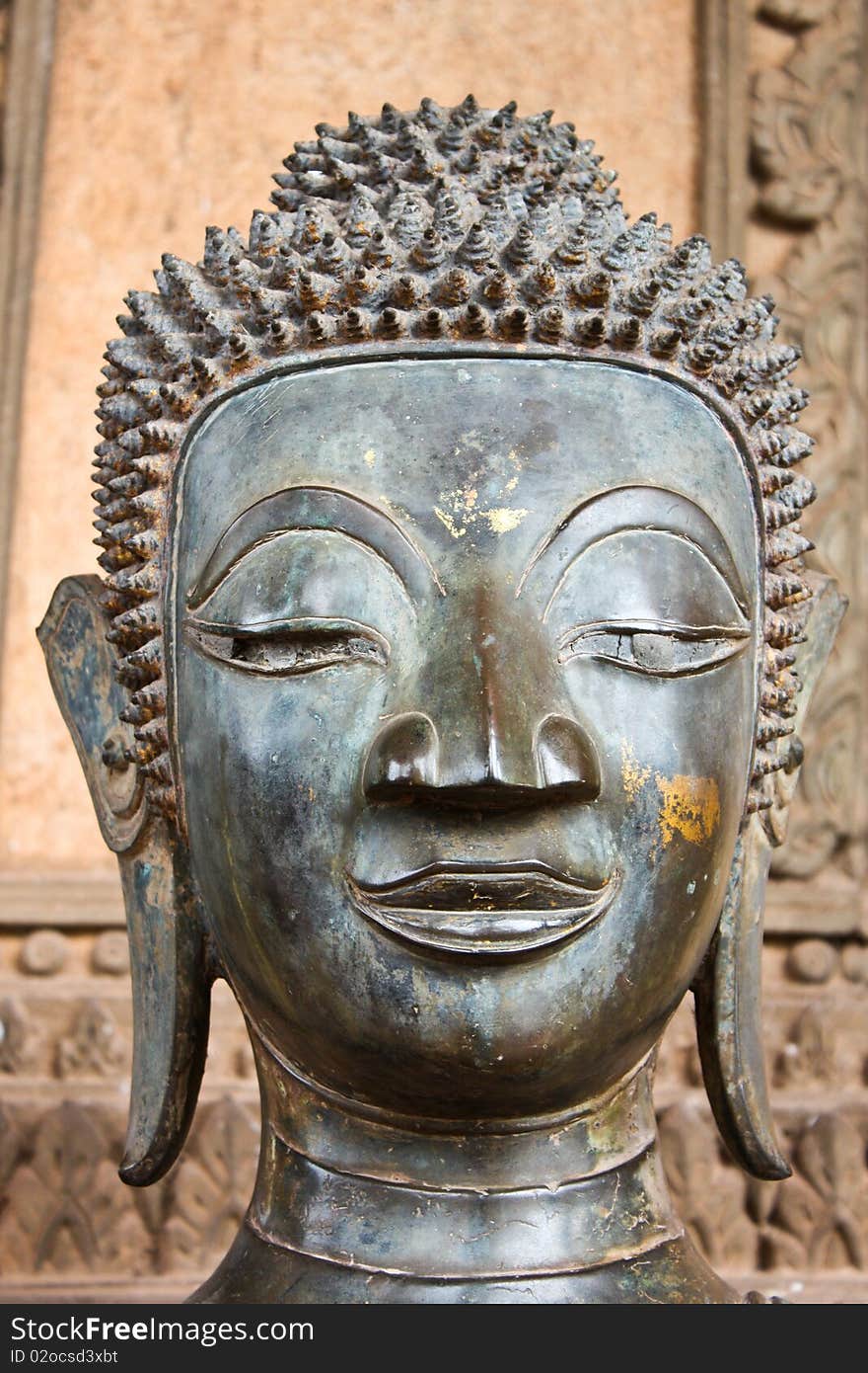 Ancient image of Buddha face standing at temple in Laos. Ancient image of Buddha face standing at temple in Laos