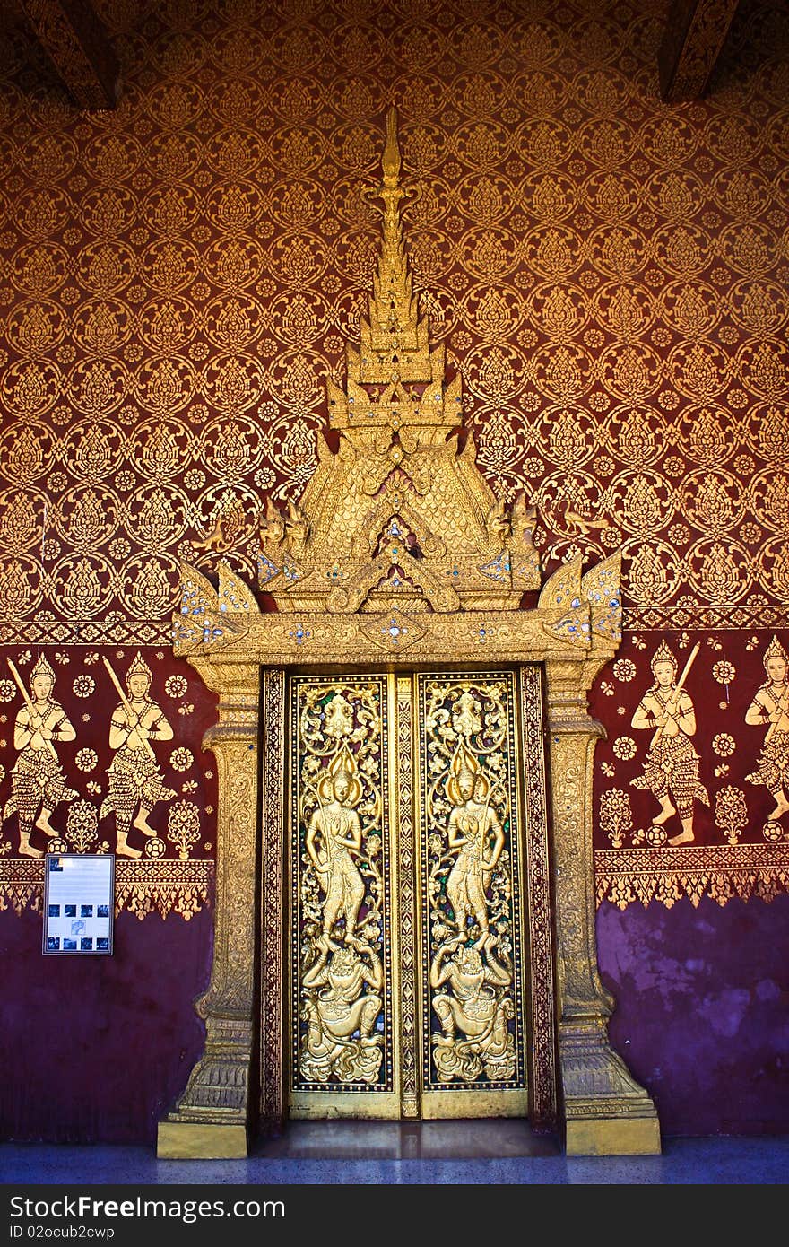 Beautiful wooden carving door that decore by carving wood in laos temple. Beautiful wooden carving door that decore by carving wood in laos temple