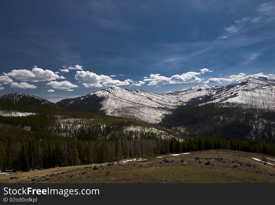 View of the mountain in the National park of the Yellowston in early spring. View of the mountain in the National park of the Yellowston in early spring