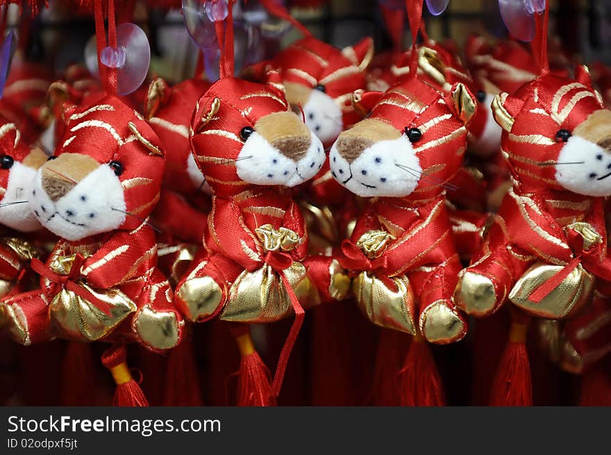 Chinese New Year. 2010 is tiger year.
SDOF. Focused on 2nd tiger from left.