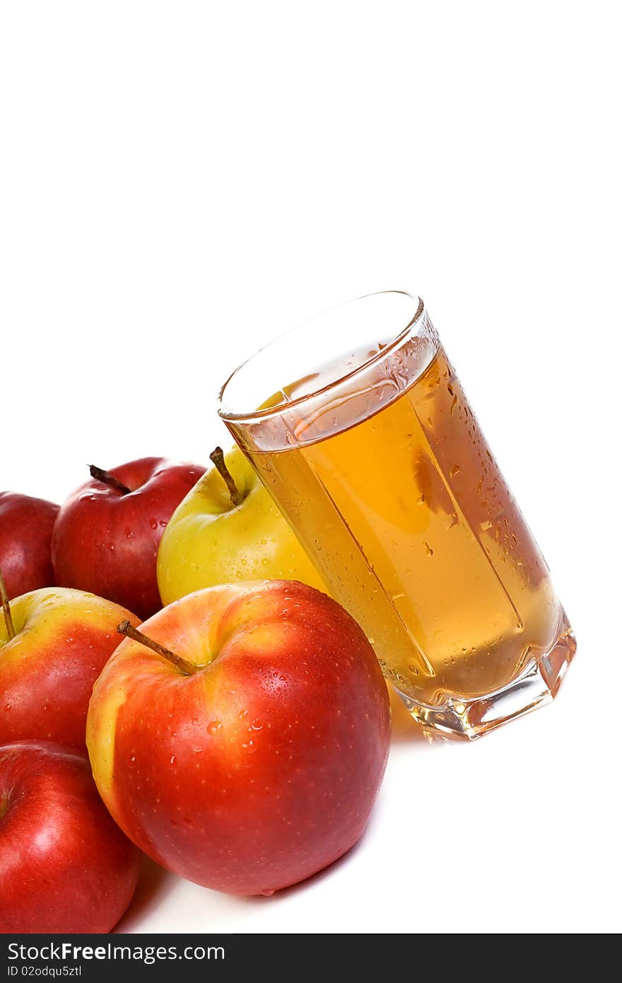 Ripe apples and glass on white