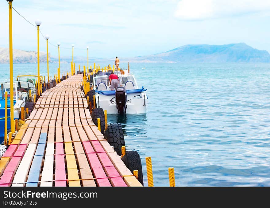 Colourful pie with boats in sea. Summertime. Colourful pie with boats in sea. Summertime.