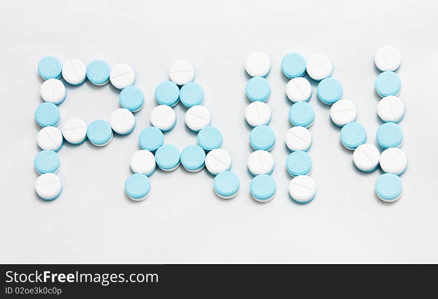 White and blue paracetamol tablets. White and blue paracetamol tablets