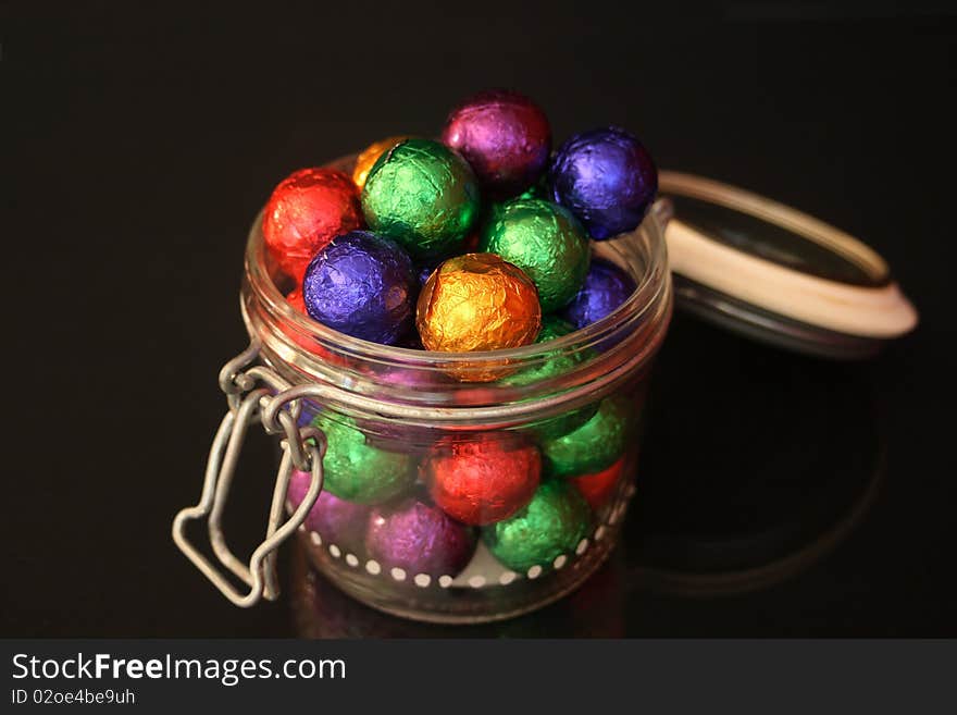 Chocolate balls in a candy jar