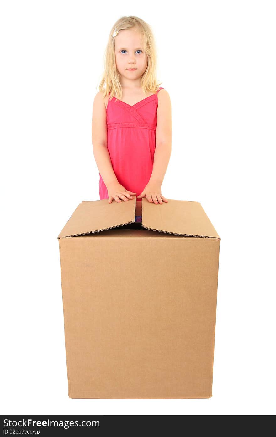 Beautiful girl opens a large cardboard box with a copy space for text. Isolated on white. Beautiful girl opens a large cardboard box with a copy space for text. Isolated on white