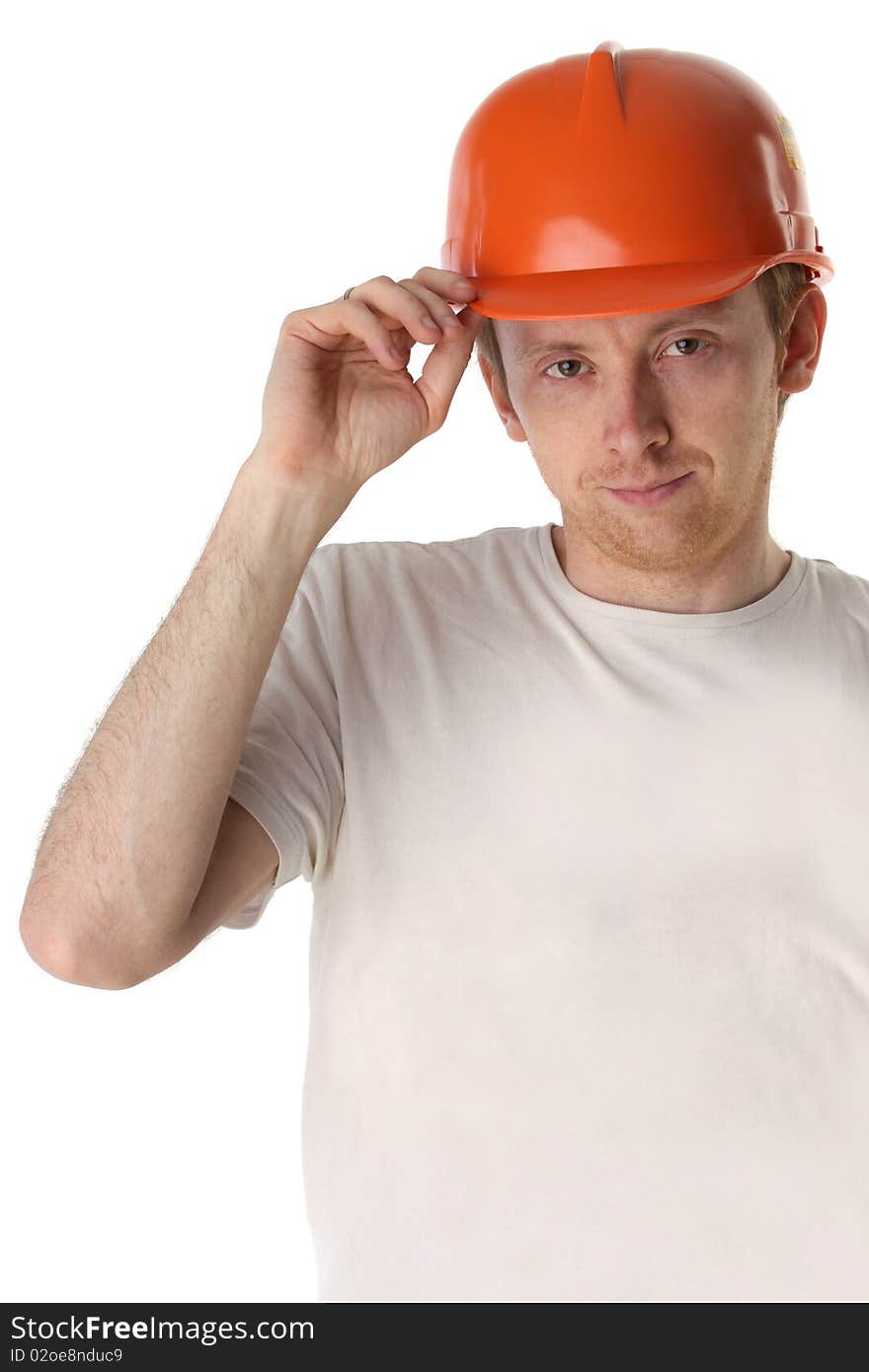 Studio portrait of a happy handyman in orange helmet