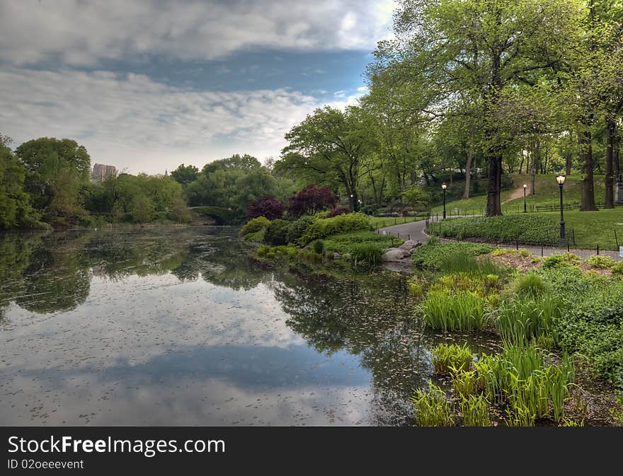 Spring at the pond in Central Park, New York City with Gapstow bridge in the background. Spring at the pond in Central Park, New York City with Gapstow bridge in the background