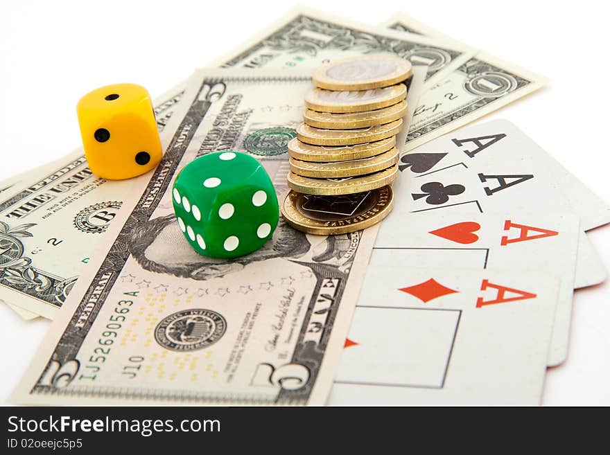 Dice, dollars and playing cards, isolated on a white background. Dice, dollars and playing cards, isolated on a white background