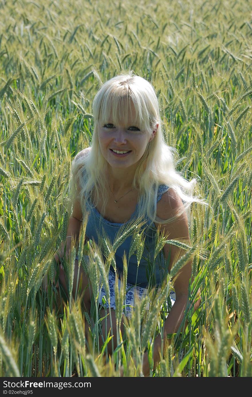 Blond woman in field