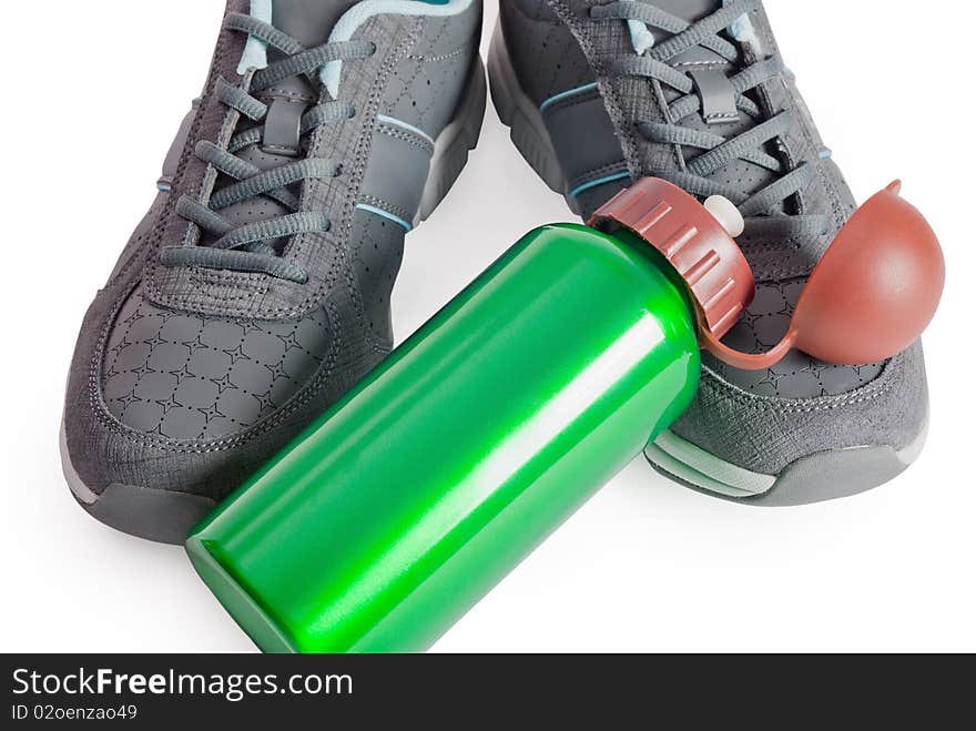 Sports footwear, thermos for water isolated on white background. Sports footwear, thermos for water isolated on white background.