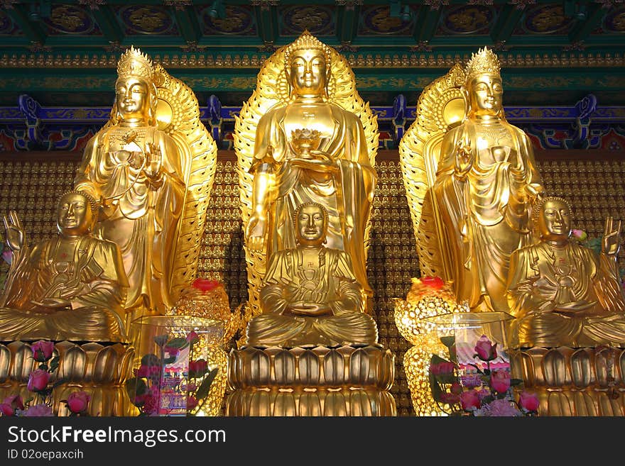 The golden buddha and kuan.