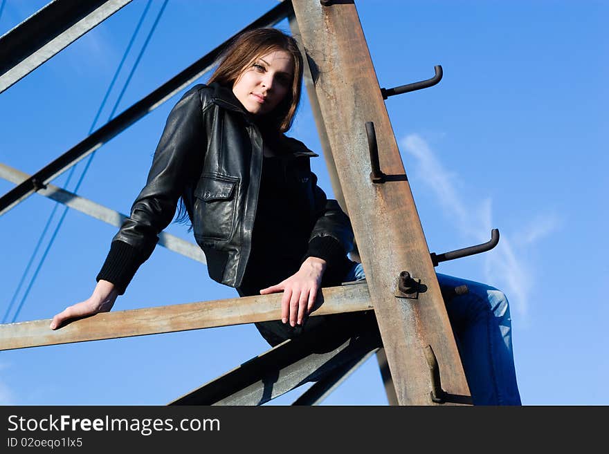 Woman On Electrical Tower