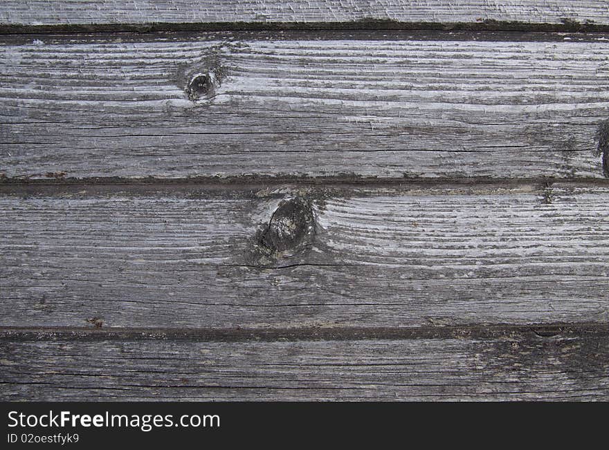 Very old boards with splinters are photographed as a structure